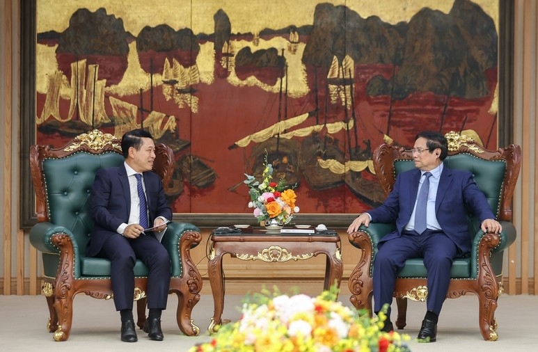 Vietnam, Laos boost strategic cooperation through SOE reform experience
